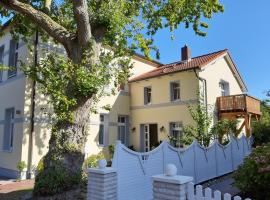 Ferienwohnung Villa im Park, отель в городе Вангероге