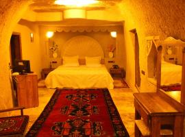 होटल की एक तस्वीर: Dilek Tepesi Cave Hotel