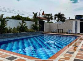 รูปภาพของโรงแรม: Aguamarina Inn - Casa de descanso con piscina - Tauramena Casanare