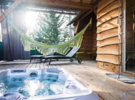 Hình ảnh khách sạn: Charmante Cabane dans les arbres avec jacuzzi et sauna