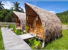 Palayan Paradise Huts, hotel in San Vicente