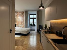 รูปภาพของโรงแรม: Apartamenty Rynek 5