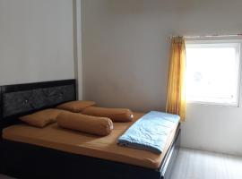 Hotel Foto: OYO 91162 Homestay Ansyariah Syariah