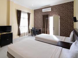 Hotel Photo: Carolina Transit Medan Mitra RedDoorz