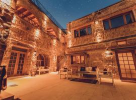 होटल की एक तस्वीर: Pinhan Cave Suites