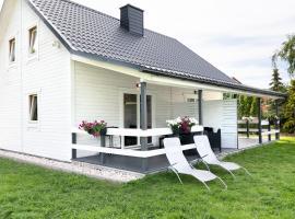 Jantar Domki Comfort oraz Comfort Wellness Zone sauna jacuzzi、ヤンタルのホテル