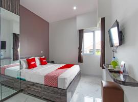 รูปภาพของโรงแรม: Super OYO Capital O 91665 D'prof Exclusive Guesthouse