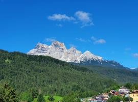 Hotel Foto: Accogliente attico vista Dolomiti