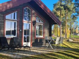 Fotos de Hotel: Lakeside log cabin Främby Udde Falun
