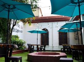 Gambaran Hotel: 4 Grados Hostal