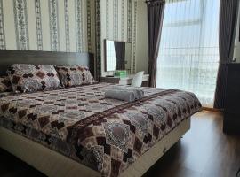 Foto di Hotel: Comfy Apartment Grand Sungkon Lagoon