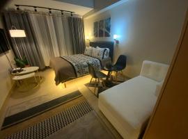 รูปภาพของโรงแรม: The Haven at One Eastwood Tower 1