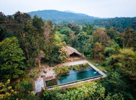 होटल की एक तस्वीर: Dudhsagar Plantation