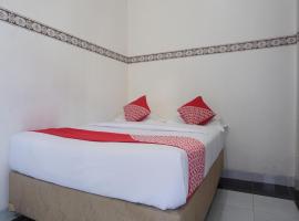 Gambaran Hotel: OYO 91900 Wisma Amrach