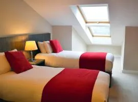Carrick Plaza Suites and Apartments