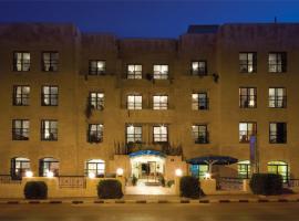 Hotel Photo: Delmon Suites