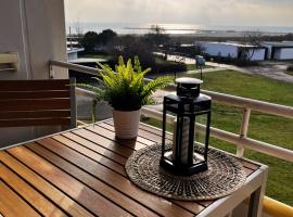 Quartier Südstrand - Ferienwohnung mit Meerblick, ξενοδοχείο σε Fehmarn
