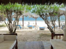 Hotel Photo: Fantastic beach front cottage with shared pool