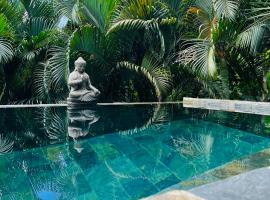Hotel fotografie: Ô Palm : dans un petit écrin de verdure