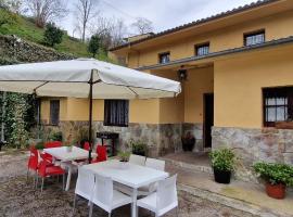 होटल की एक तस्वीर: Río España - Casa amplia con patio y barbacoa en Villaviciosa