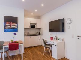 Fotos de Hotel: IMMOCITY Apartments