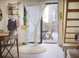 Gambaran Hotel: Duplex dans village avec jardin