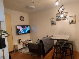 Davao Vacation Hub near Sasa ferry terminal with netflix,Wifi, pool access, hotel in Davao City