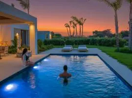 TAF Villas Beach Resort with Tesla