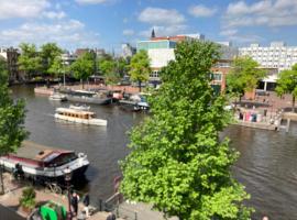 Hotel fotoğraf: Petite city center loft on Amstel river