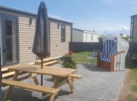 รูปภาพของโรงแรม: Campingland Ostsee - Mobilheim 76Strandhafer NEU!