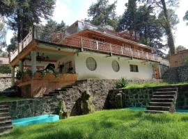 Fotos de Hotel: Hermosa cabaña vista al bosque