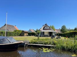 Hotel fotoğraf: Vakantiehuis aan het water in Friesland