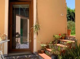 Gambaran Hotel: La stanza in giardino