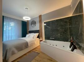 Gambaran Hotel: Caroline Jacuzzi Apartments