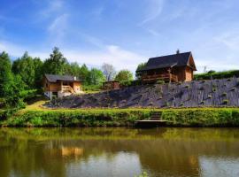 Photo de l’hôtel: Siedlisko Sielska Dolina Nad Stawem luksusowy domek całoroczny z fińską sauną