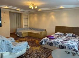 รูปภาพของโรงแรม: Уютная квартира Н.Абдирова 32