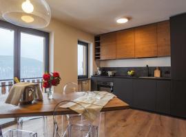 รูปภาพของโรงแรม: La Rosa delle Alpi Luxury Apartment