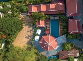 รูปภาพของโรงแรม: Garden Village Guesthouse & Pool Bar