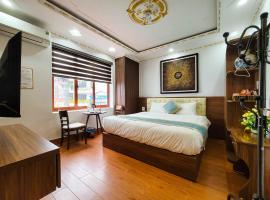 होटल की एक तस्वीर: Minh Quang Hotel Sapa