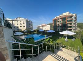 A picture of the hotel: Residence with sea view and pool