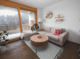 Cosy, stylish new flat with spa and gym & shuttle to ski lifts, Hotel in Laax