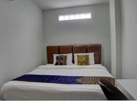 Gambaran Hotel: SPOT ON 92822 Finest House Near Amplas Bus Terminal