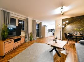 Foto di Hotel: Exklusives-City-Apartment mit gratis Tiefgarage, Balkon, Waschtrockner, Netflix