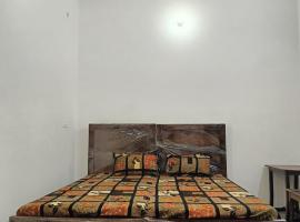 Hotel Foto: Shree Yamunaji Kripa Kunj