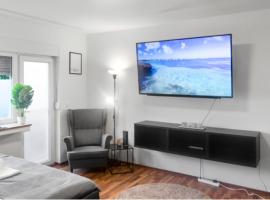 ホテル写真: Relax Oasis with 65 SmartTV, Kitchen and Balcony