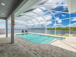 Hotel foto: Heaven Found! Stunning River Views & Pool - Villa Island Sunset - Roelens Vacations