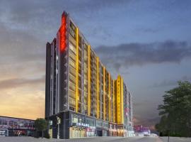 许昌曹魏古城胖东来劳动兰欧尚品酒店，許昌的飯店