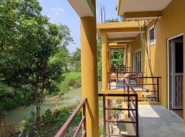 รูปภาพของโรงแรม: Bardia Jungle Cottage