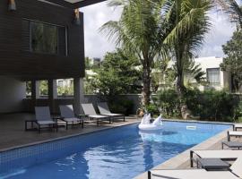 Hotel kuvat: Montecrista Appart moderne et cosy, 1 chambre à 2 min plage Pereybere