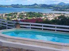 Hotelfotos: Appartement d'une chambre avec vue sur la mer piscine partagee et jardin clos a Le Robert